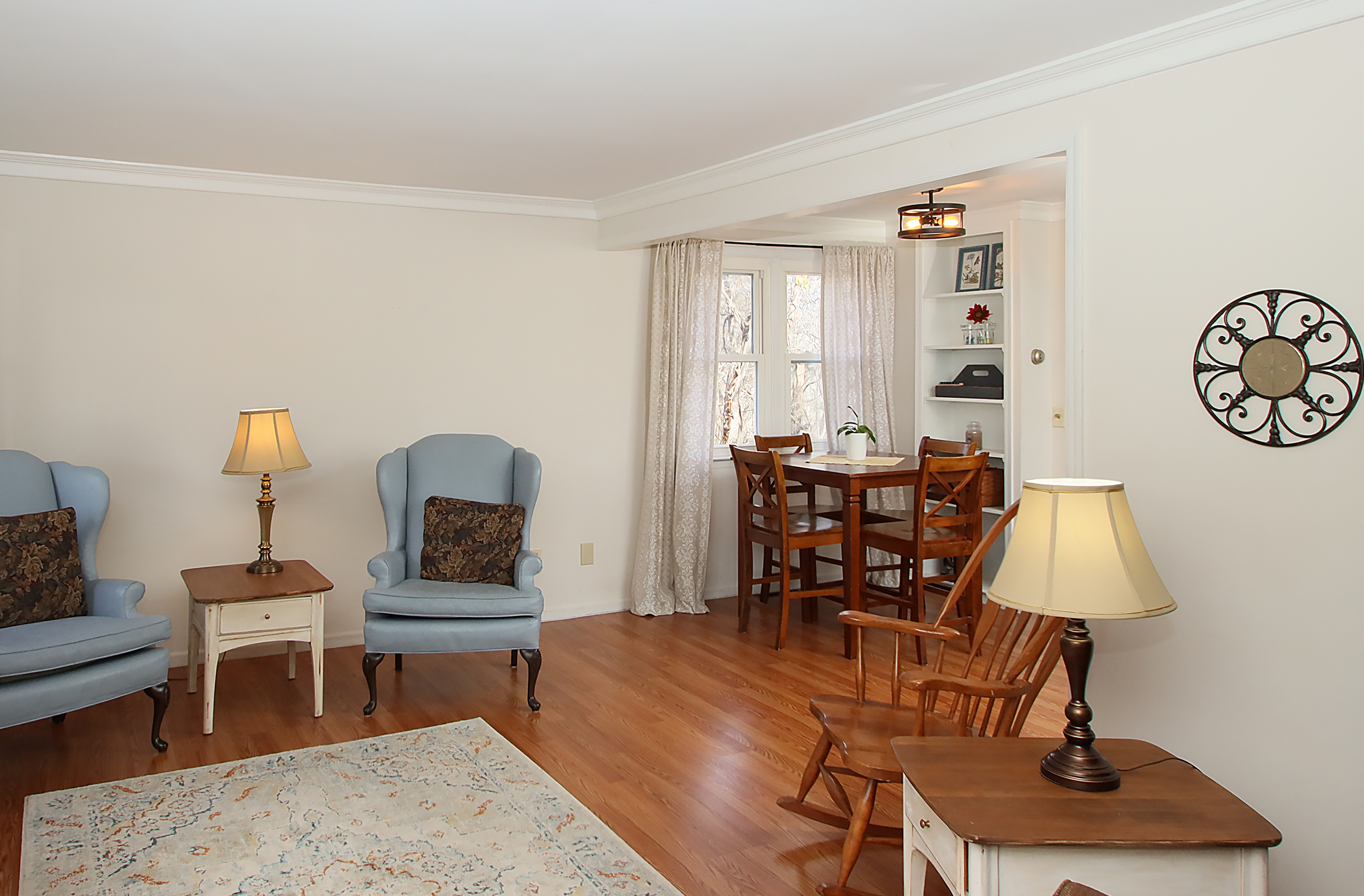 20 Carriage Drive Clinton, CT 06413 - Photo 4 of 31 a living room with furniture and a lamp