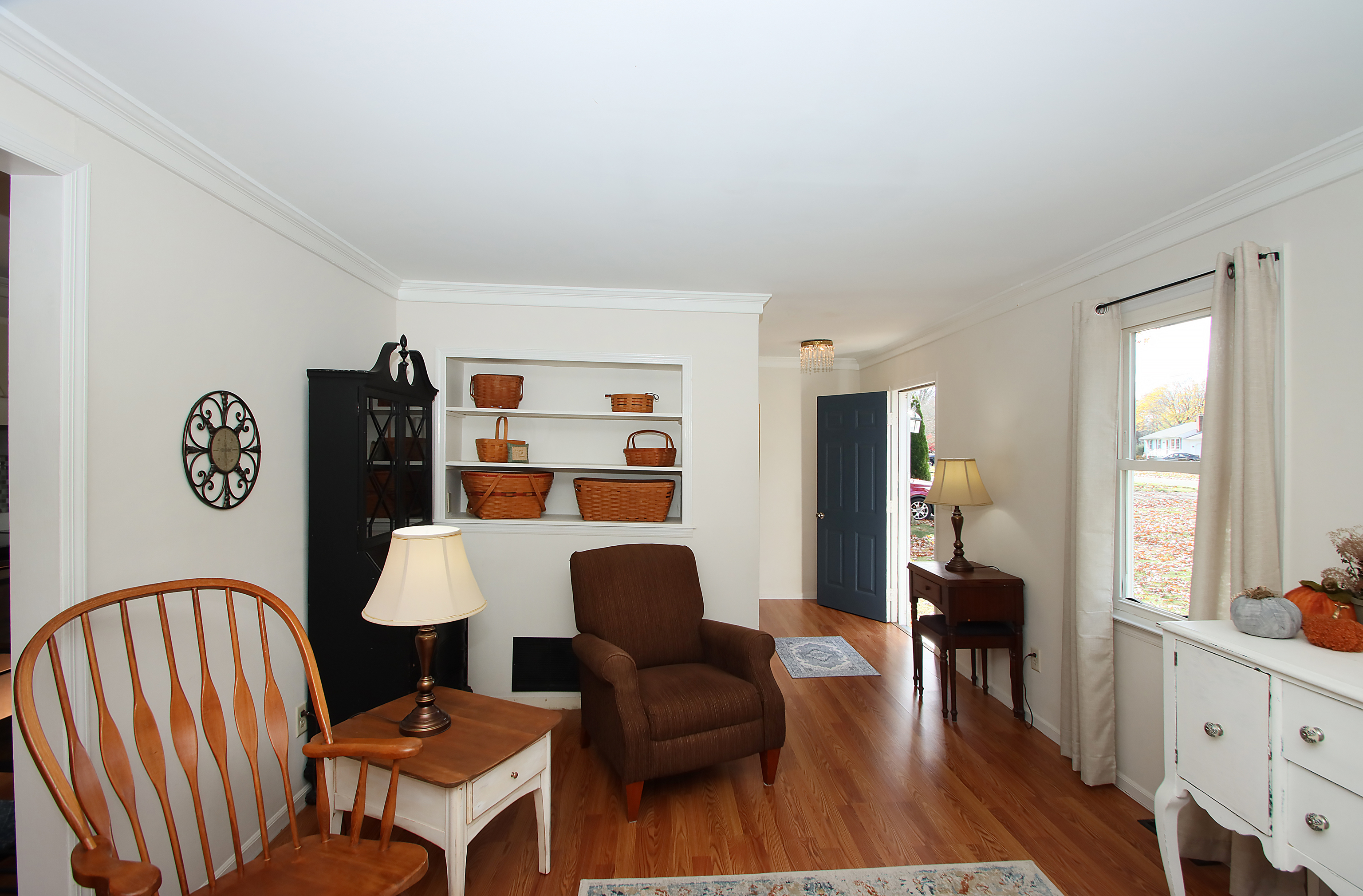 20 Carriage Drive Clinton, CT 06413 - Photo 5 of 31 a living room with furniture a rug and a window