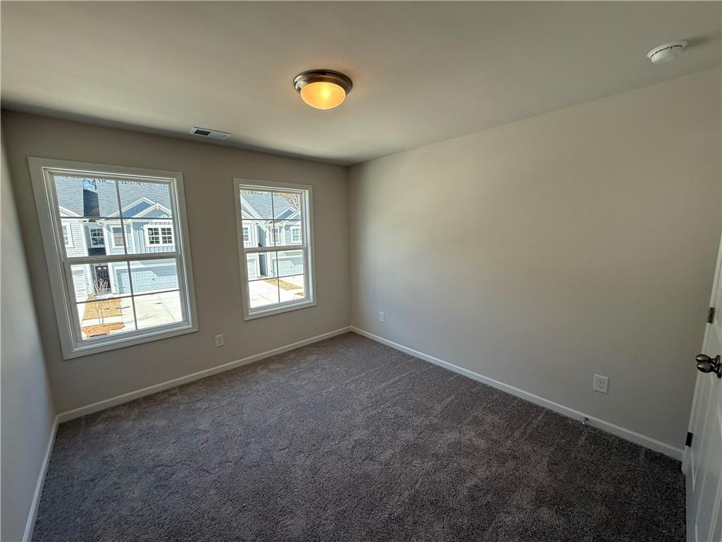 5151 Longview Run Decatur, GA 30035 - Photo 11 of 16 an empty room with windows