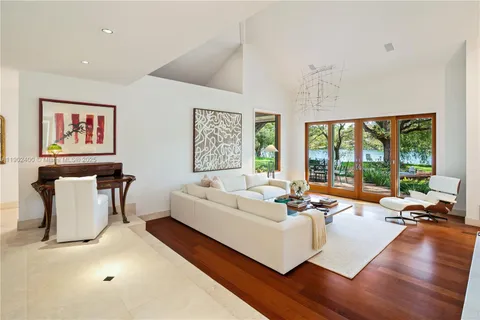 a work room with furniture and a window