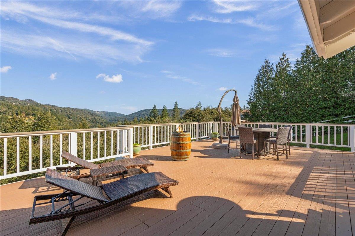 25400 Radonich Road Los Gatos, CA 95033 - Photo 26 of 42 a view of a balcony with lake view and wooden floor