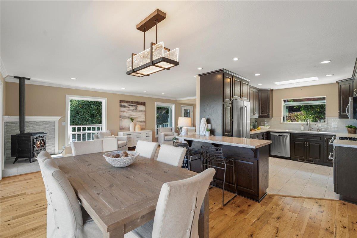 25400 Radonich Road Los Gatos, CA 95033 - Photo 8 of 42 a view of a dining room with furniture window and wooden floor