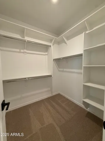 a view of an empty room with empty racks