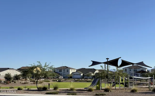 a view of outdoor space and front view of house