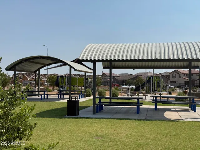 a view of swimming pool with outdoor seating