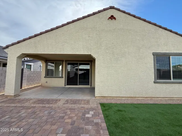 a front view of a house with yard