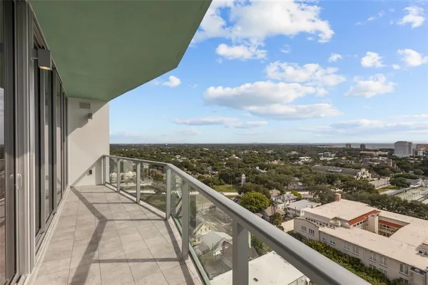 a view of a balcony with city view