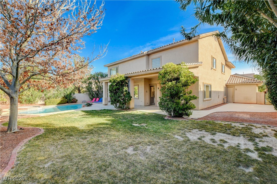 5148 Villa Vecchio Court Las Vegas, NV 89141 - Photo 66 of 71 Mediterranean / spanish-style home with a patio, fence, a fenced in pool, stucco siding, and a front lawn
