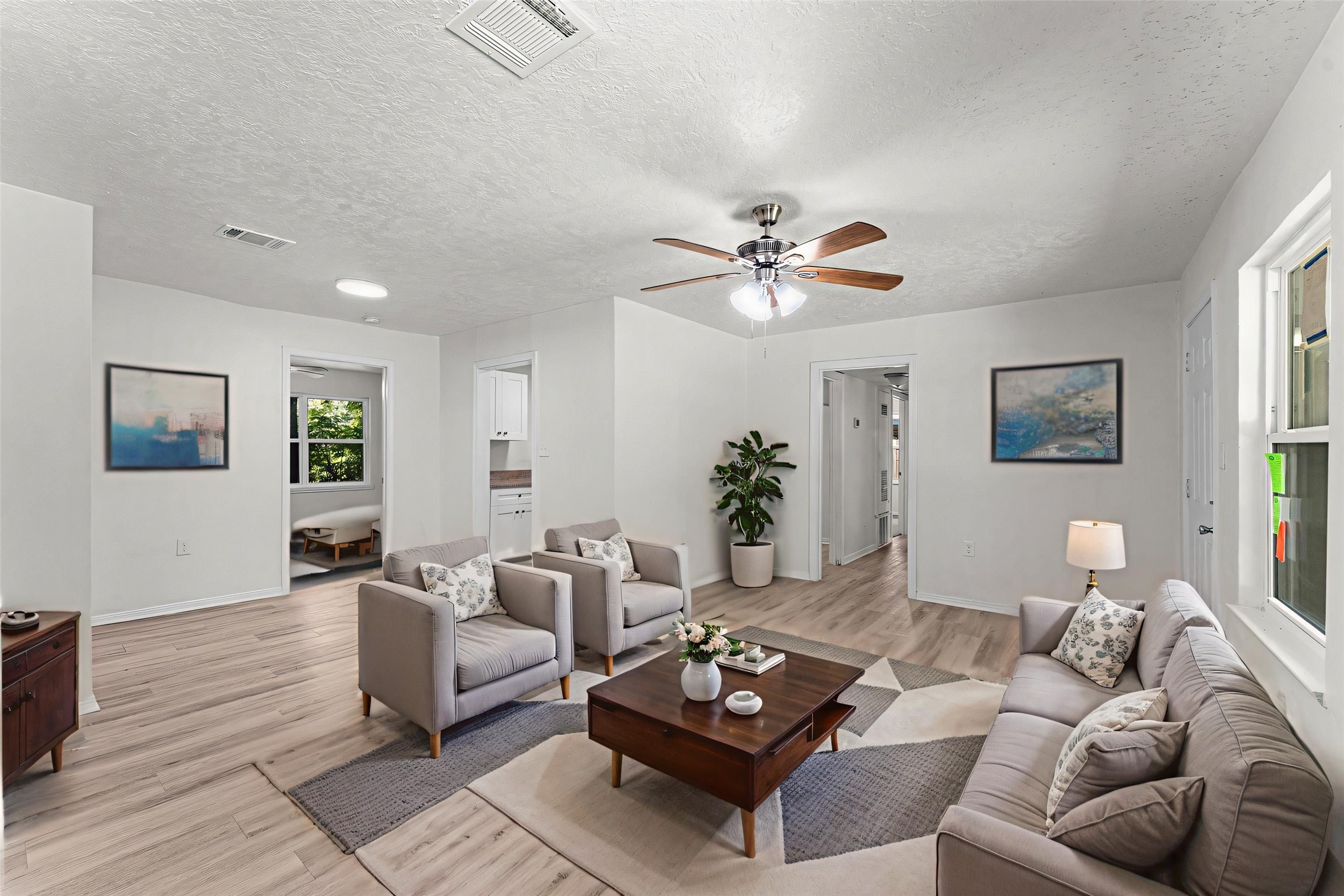 6515 Beekman Road Houston, TX 77021 - Photo 2 of 30 a living room with furniture a rug and a window