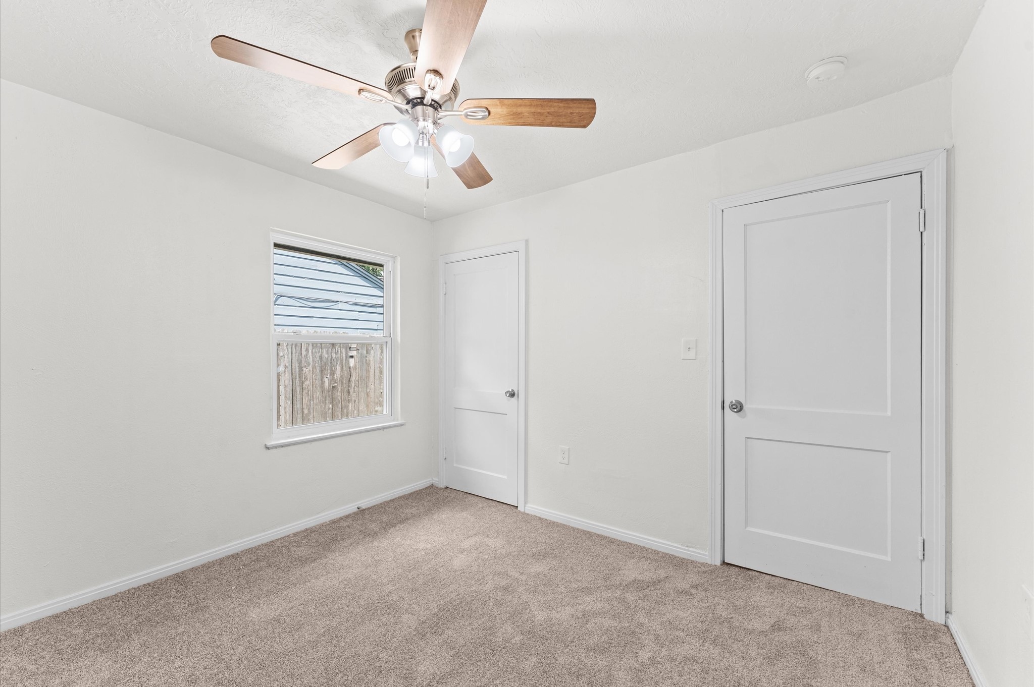 6515 Beekman Road Houston, TX 77021 - Photo 21 of 30 a view of an empty room with a window