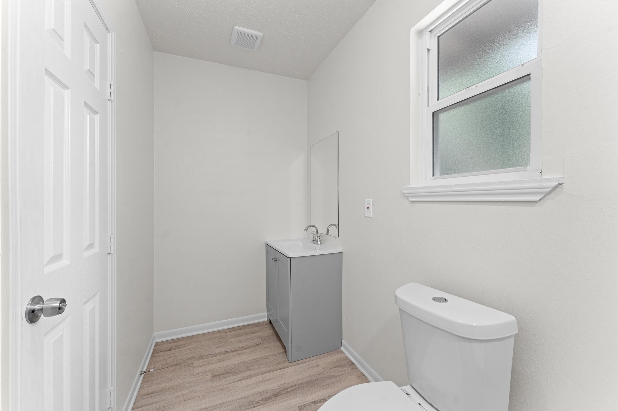 6515 Beekman Road Houston, TX 77021 - Photo 24 of 30 a bathroom with a toilet and a sink