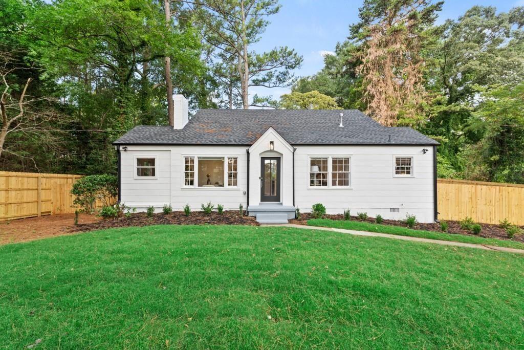 1441 Rupert Road Decatur, GA 30030 - Photo 1 of 1 a front view of a house with a garden