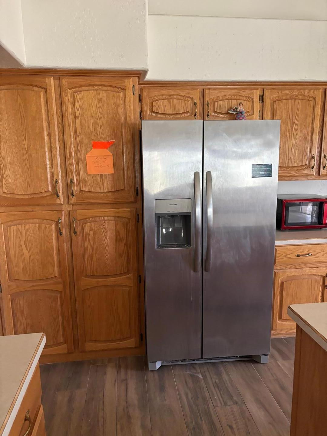 43003 North Old Mine Road Scottsdale, AZ 85262 - Photo 12 of 33 a kitchen with metallic refrigerator freezer and a dishwasher