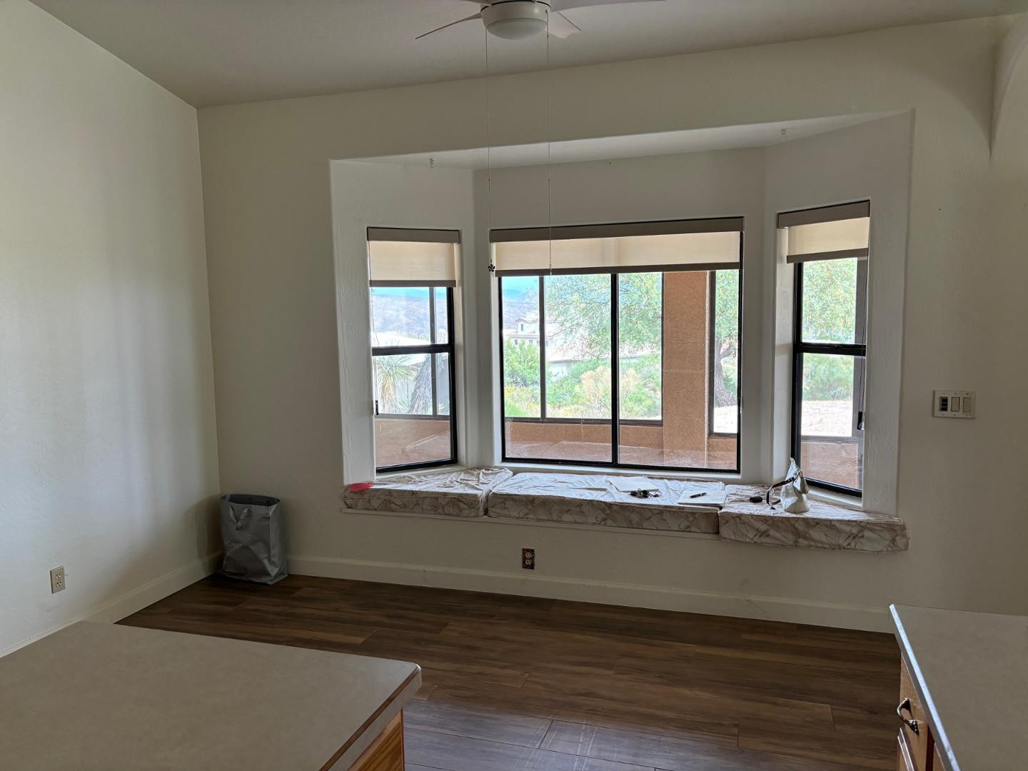 43003 North Old Mine Road Scottsdale, AZ 85262 - Photo 15 of 33 an empty room with wooden floor and window