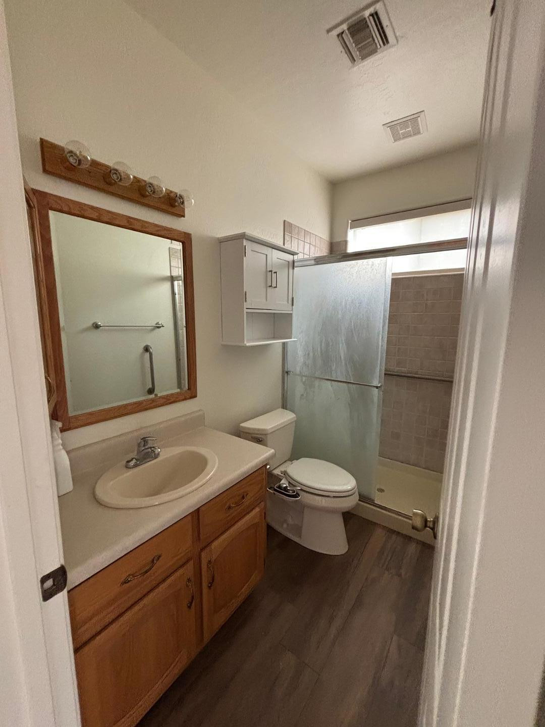 43003 North Old Mine Road Scottsdale, AZ 85262 - Photo 20 of 33 a bathroom with a granite countertop sink toilet and shower