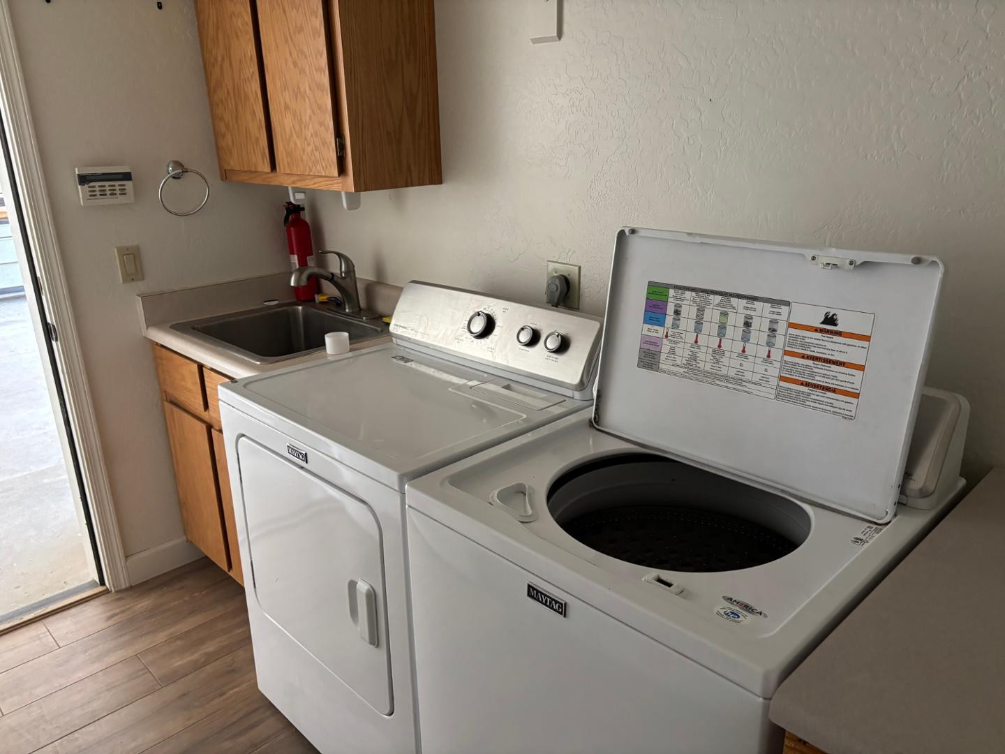 43003 North Old Mine Road Scottsdale, AZ 85262 - Photo 29 of 33 a kitchen with sink a washer and dryer
