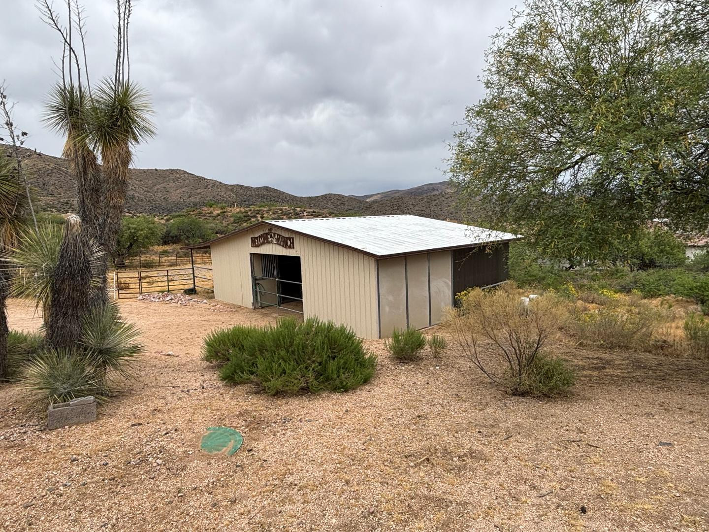 43003 North Old Mine Road Scottsdale, AZ 85262 - Photo 8 of 33 a backyard of a house with table and chairs