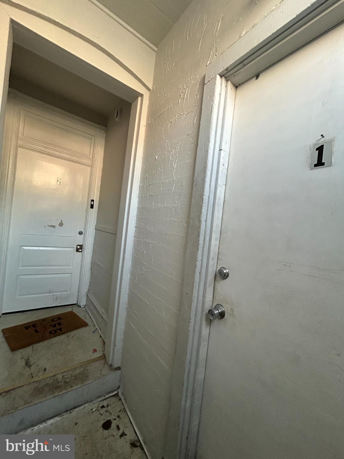 348 South Queen Street Lancaster, PA 17603 - Photo 2 of 25 Inviting entryway to cozy living spaces.