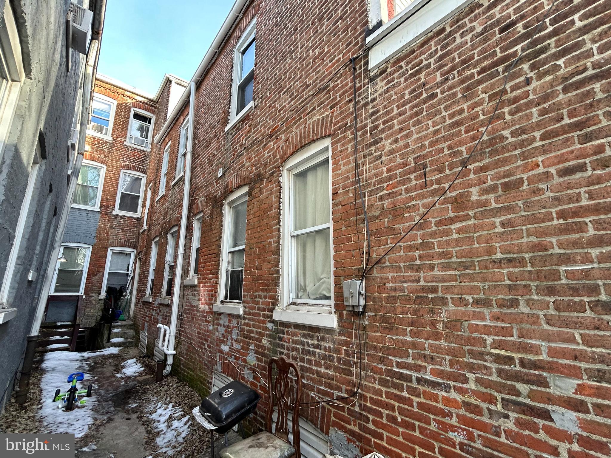 348 South Queen Street Lancaster, PA 17603 - Photo 23 of 25 Charming brick facade in urban setting.