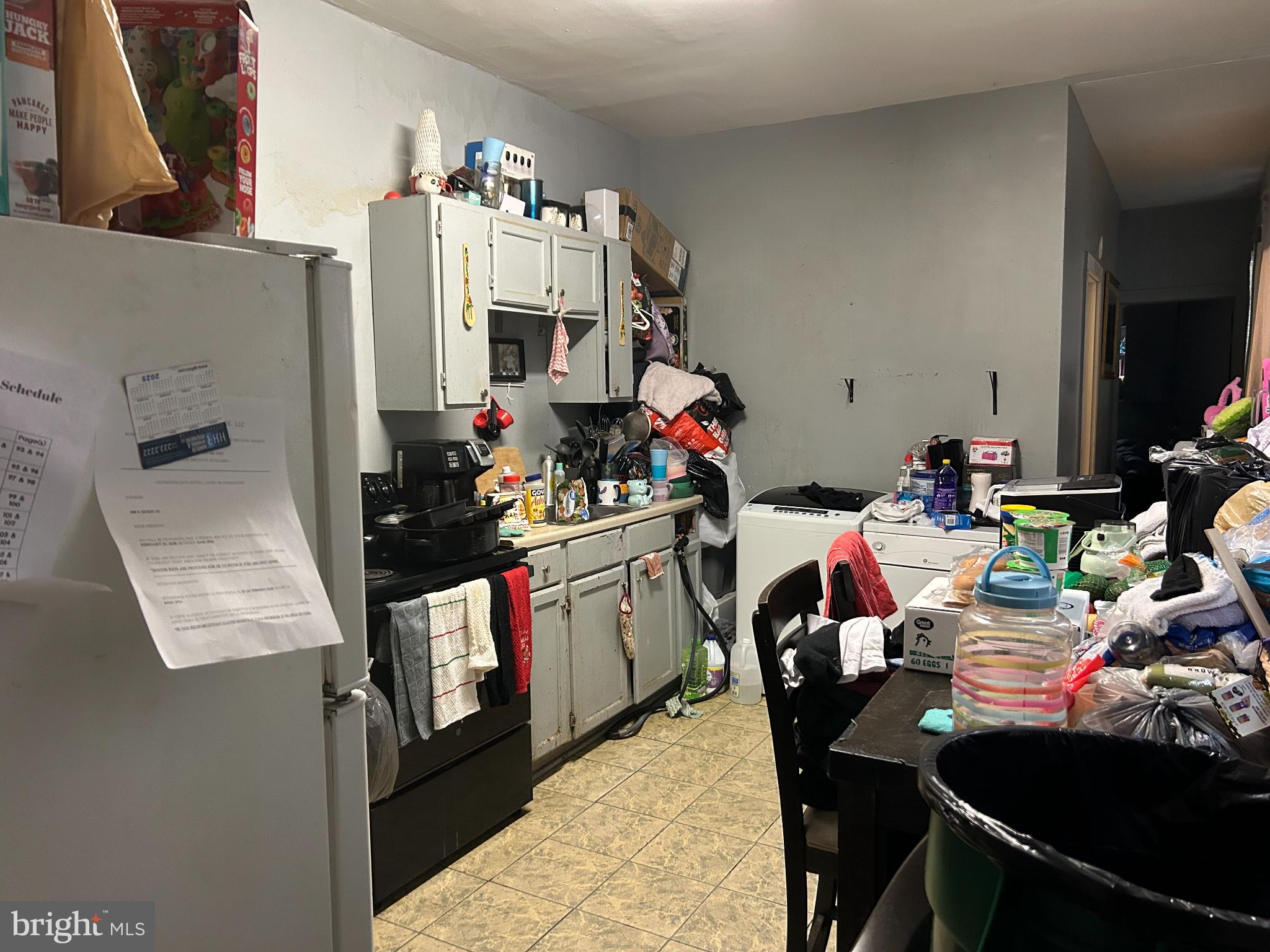 348 South Queen Street Lancaster, PA 17603 - Photo 5 of 25 Cluttered kitchen brimming with potential.