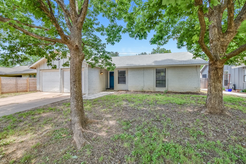 2608 Lazy Oaks Drive Austin, TX 78745 - Photo 1 of 1 a house view with a garden space