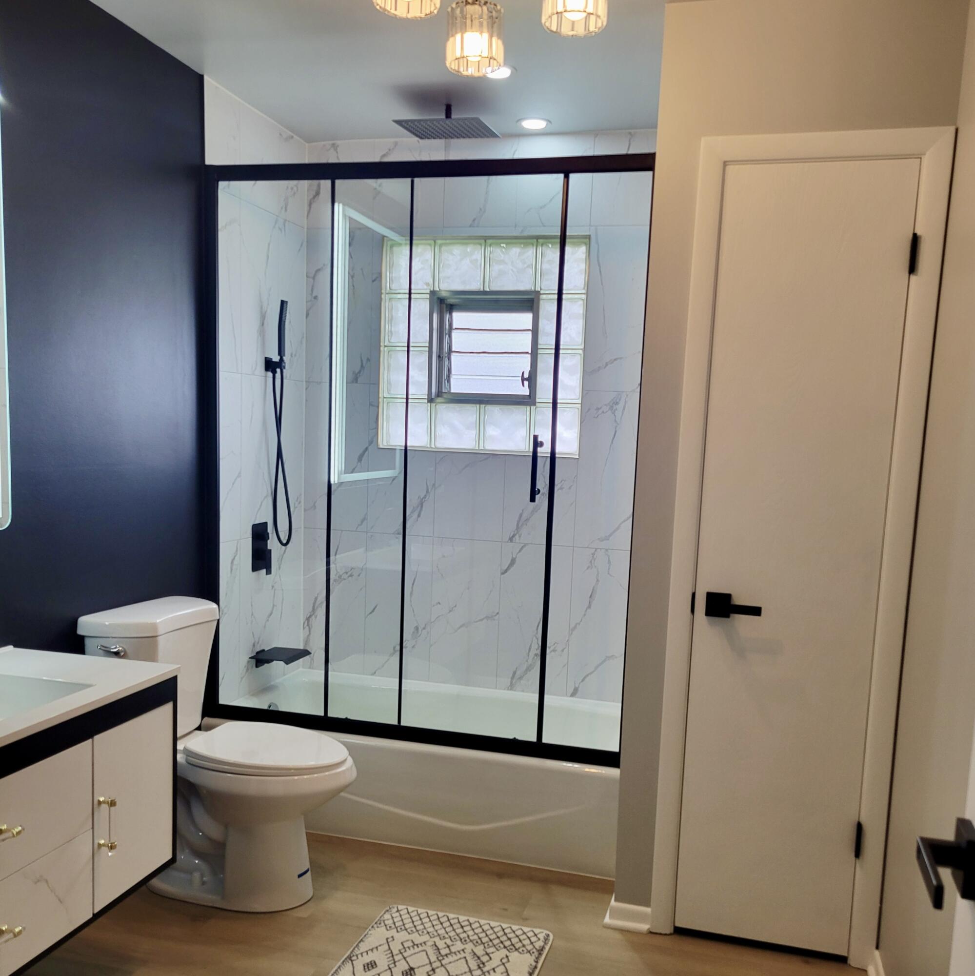 939 Devonshire Lane Dyer, IN 46311 - Photo 17 of 25 a bathroom with a toilet and a shower