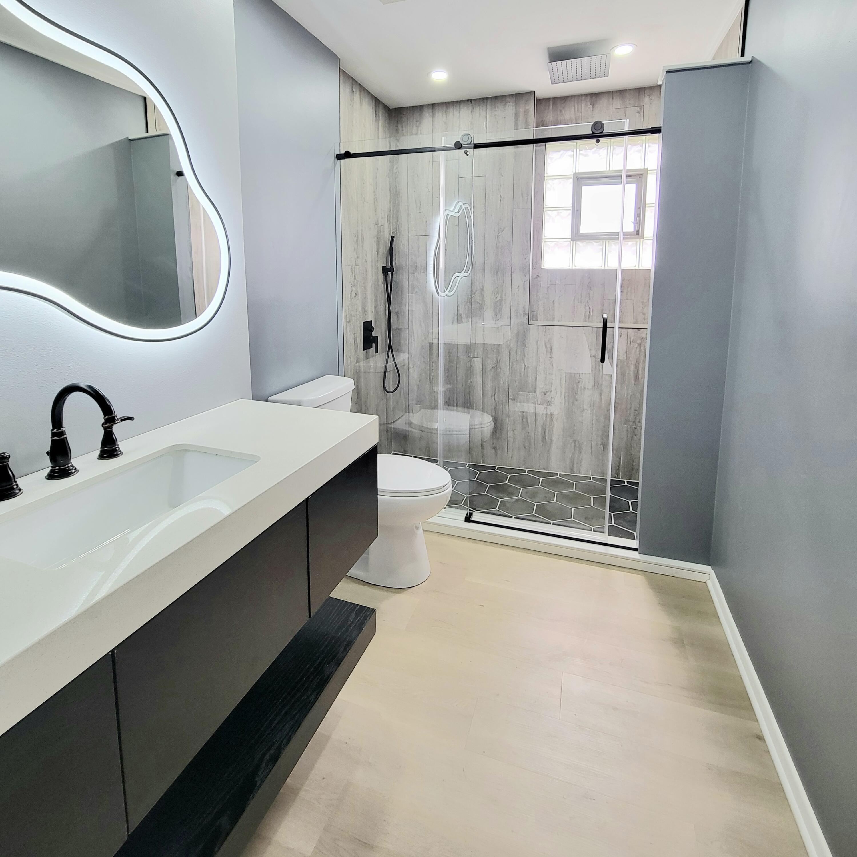 939 Devonshire Lane Dyer, IN 46311 - Photo 25 of 25 a bathroom with a double vanity sink toilet and shower
