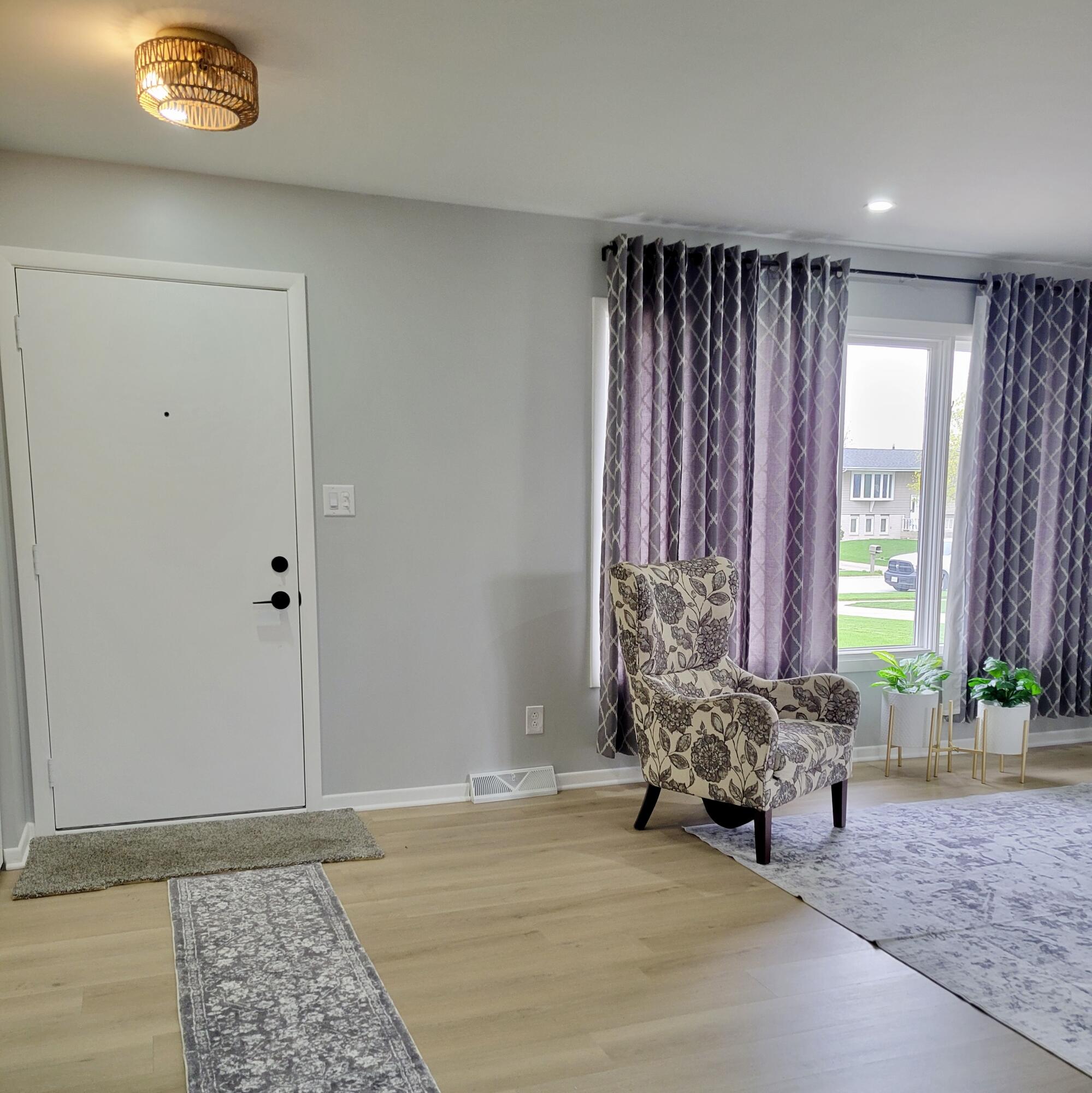 939 Devonshire Lane Dyer, IN 46311 - Photo 6 of 25 a bed room with a bed and a window