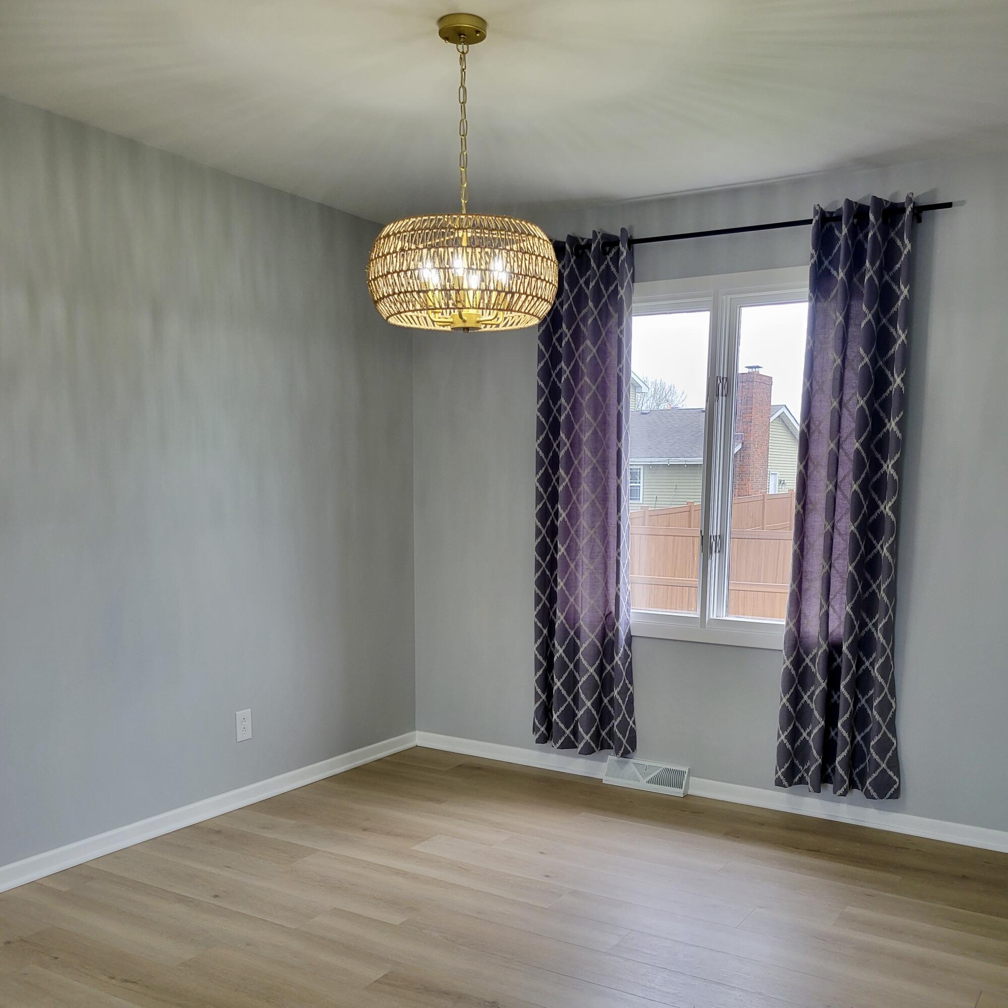 939 Devonshire Lane Dyer, IN 46311 - Photo 10 of 25 a view of an empty room with a window