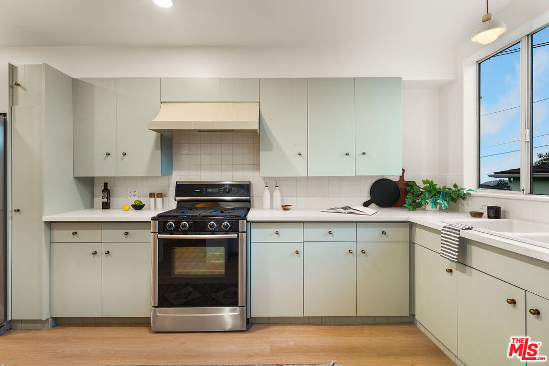 3330 Paraiso Way La Crescenta, CA 91214 - Photo 13 of 38 a kitchen with cabinets appliances and a sink