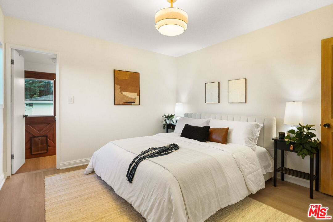 3330 Paraiso Way La Crescenta, CA 91214 - Photo 18 of 38 a bedroom with a bed and a window