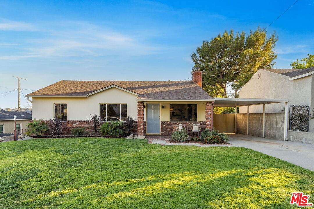 3330 Paraiso Way La Crescenta, CA 91214 - Photo 2 of 38 a front view of house with yard and green space