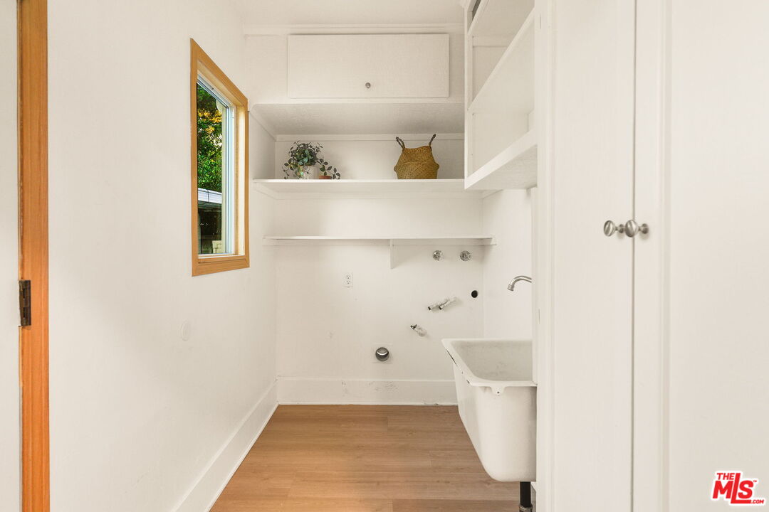 3330 Paraiso Way La Crescenta, CA 91214 - Photo 24 of 38 a view of a hallway with white walls and a window