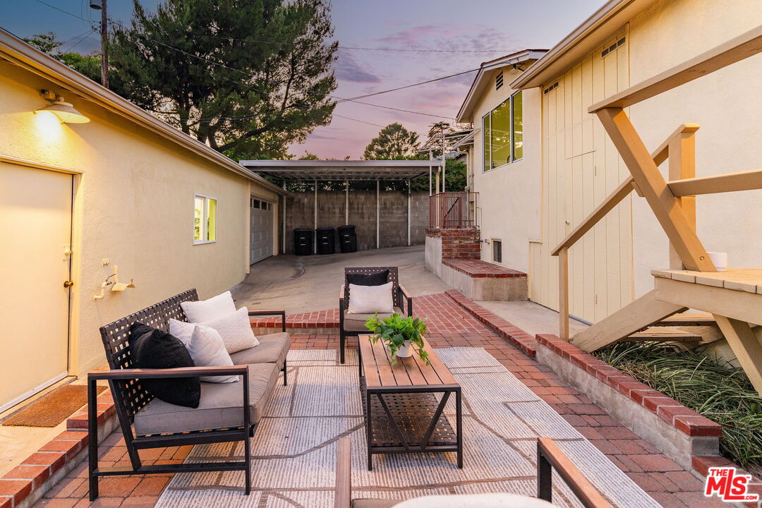 3330 Paraiso Way La Crescenta, CA 91214 - Photo 26 of 38 a view of house with a chairs and table in a patio