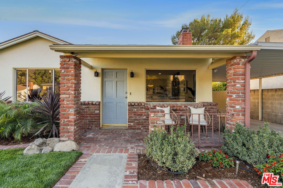 3330 Paraiso Way La Crescenta, CA 91214 - Photo 3 of 38 a view of a house with patio outdoor seating area