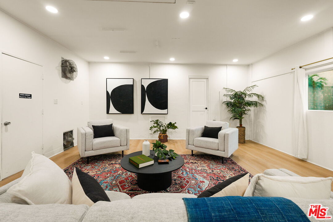 3330 Paraiso Way La Crescenta, CA 91214 - Photo 32 of 38 a living room with furniture and a flat screen tv