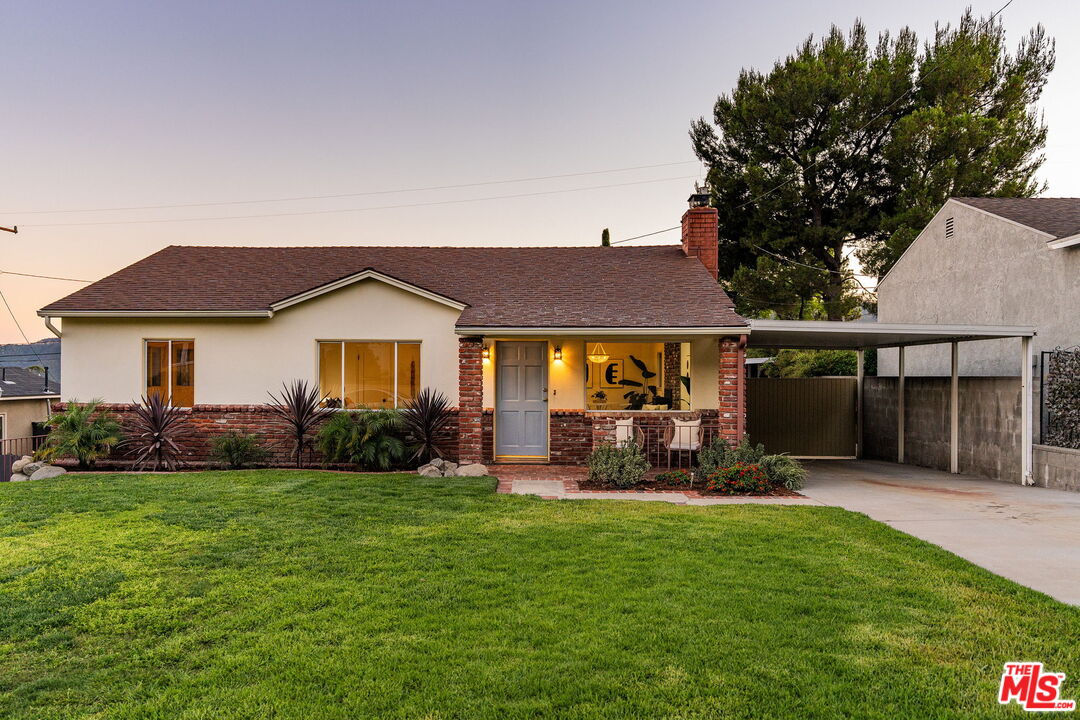 3330 Paraiso Way La Crescenta, CA 91214 - Photo 34 of 38 a view of a house with a yard and sitting area