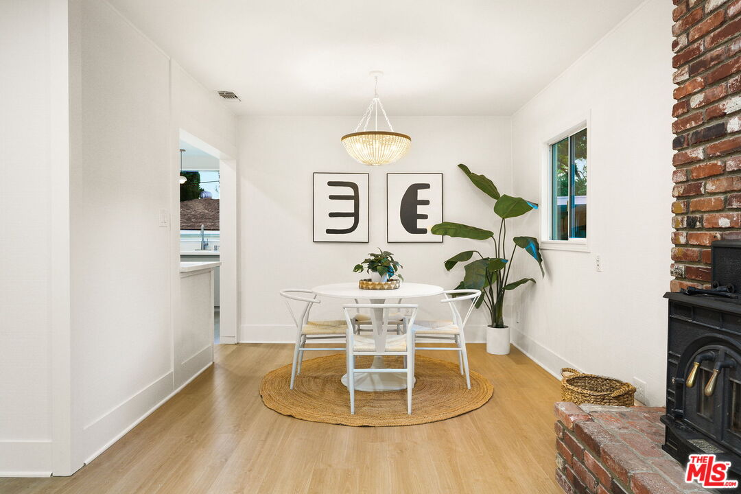 3330 Paraiso Way La Crescenta, CA 91214 - Photo 9 of 38 a view of a dining room with furniture and wooden floor