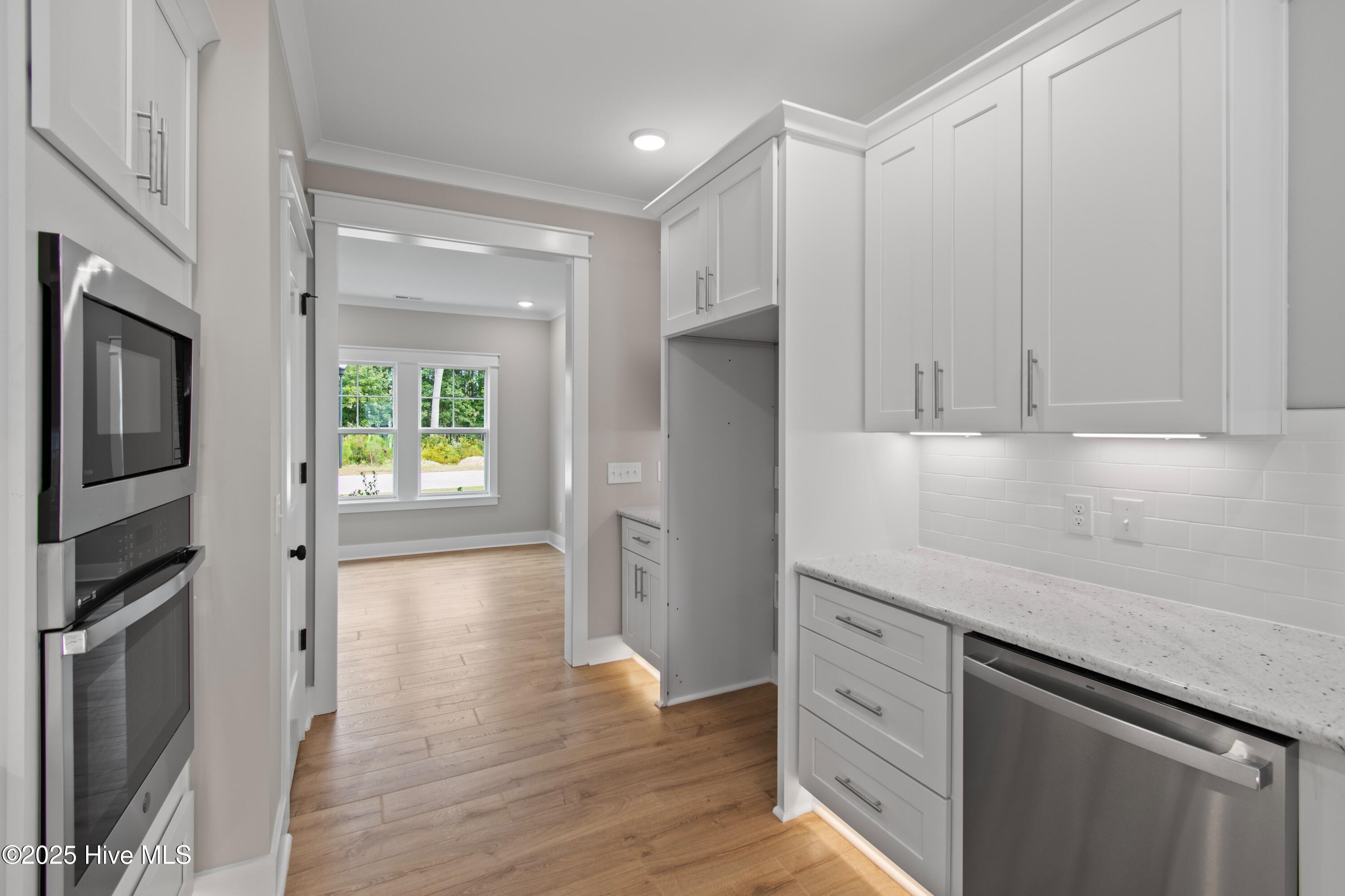1644 Back Bay Drive Southwest, Unit L47 Shallotte, NC 28470 - Photo 20 of 53 Kitchen opening to Dining Room