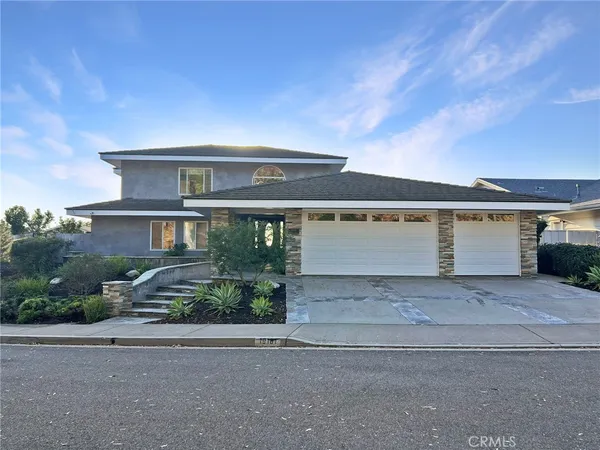 front view of house with a yard