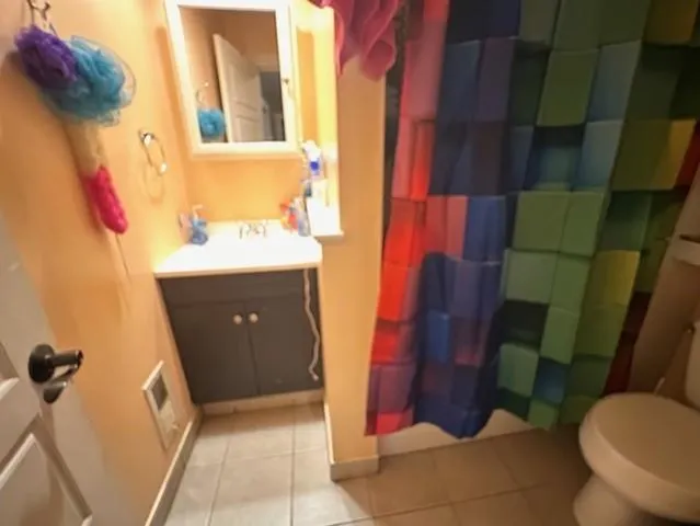 a bathroom with a sink and toilet