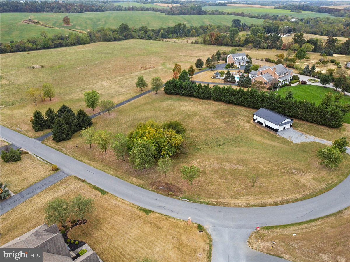 2565 Echo Springs Road, Unit LOT 8 Chambersburg, PA 17202 - Photo 11 of 26 an aerial view of a house with a lake view
