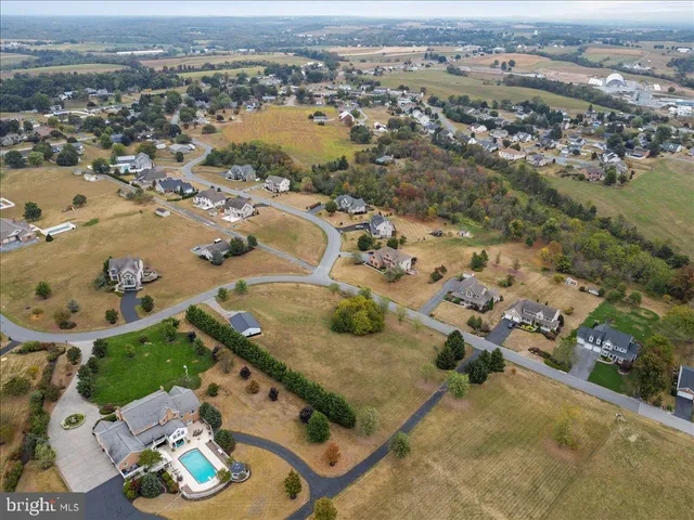 an aerial view of a house with a outdoor space
