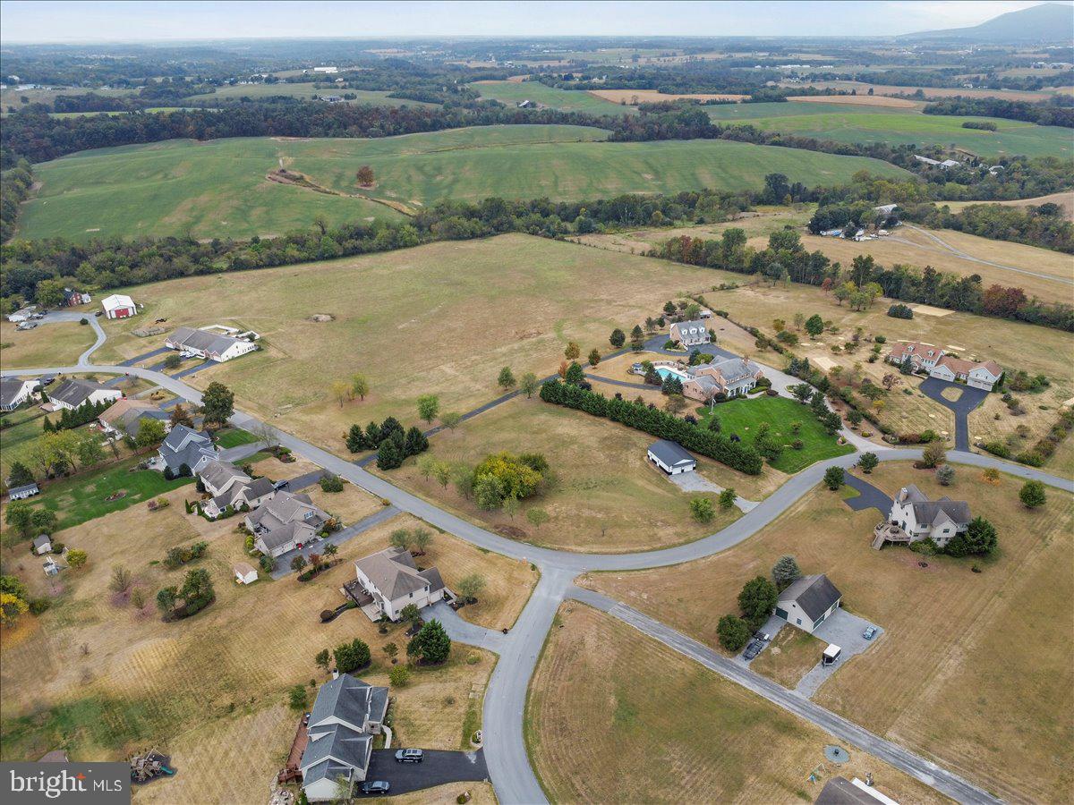 2565 Echo Springs Road, Unit LOT 8 Chambersburg, PA 17202 - Photo 18 of 26 an aerial view of a house with a yard