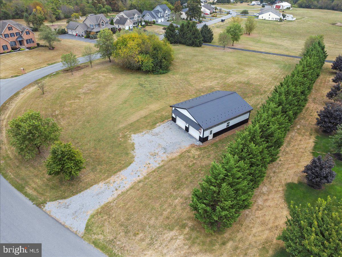 2565 Echo Springs Road, Unit LOT 8 Chambersburg, PA 17202 - Photo 9 of 26 a view of a swimming pool with a yard