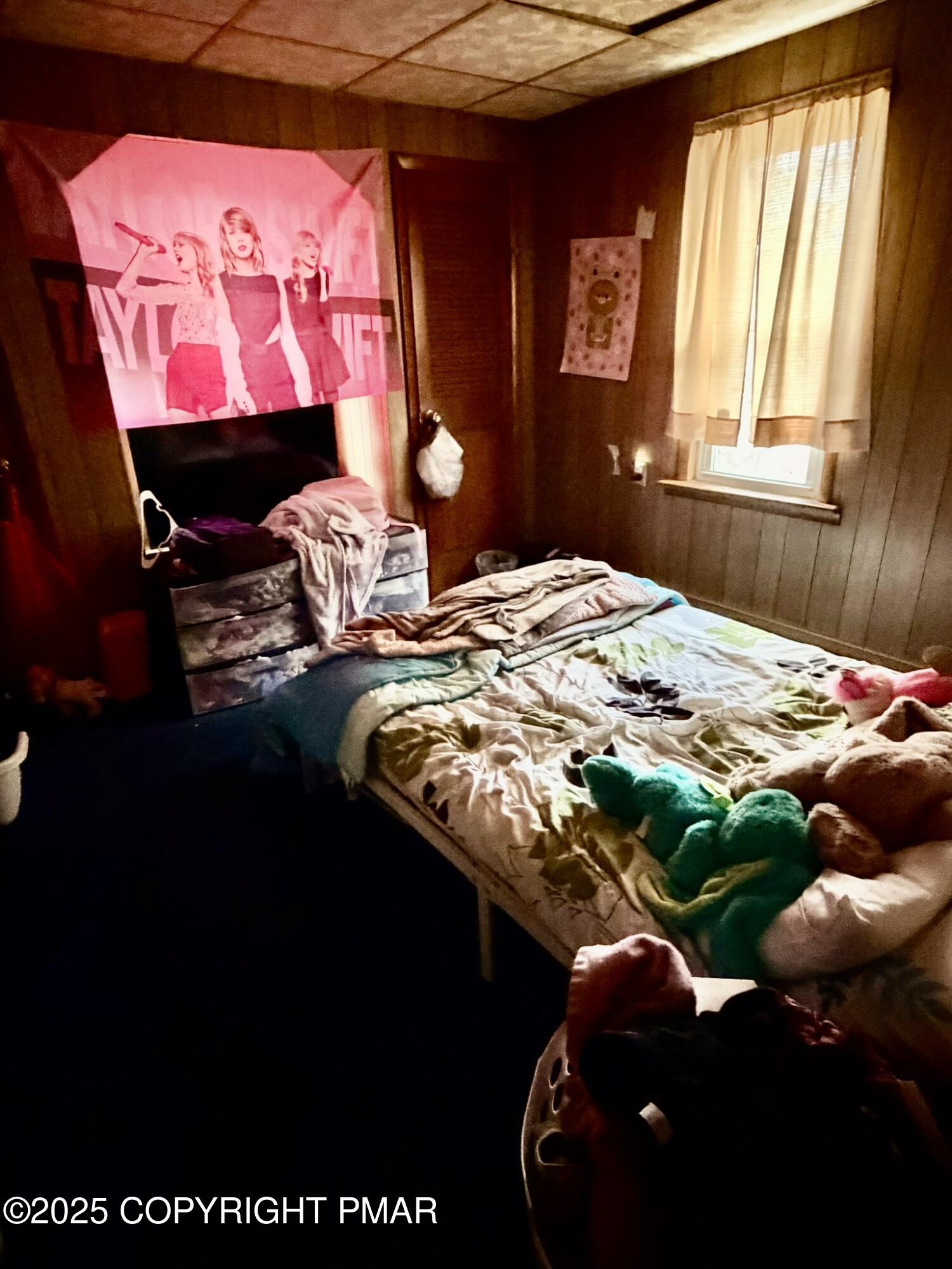 524 Independence Road East Stroudsburg, PA 18301 - Photo 15 of 17 a bedroom with a bed and a window