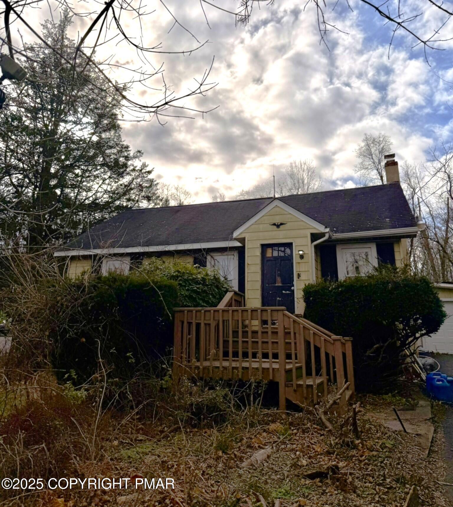 524 Independence Road East Stroudsburg, PA 18301 - Photo 2 of 17 a front view of a house with garden