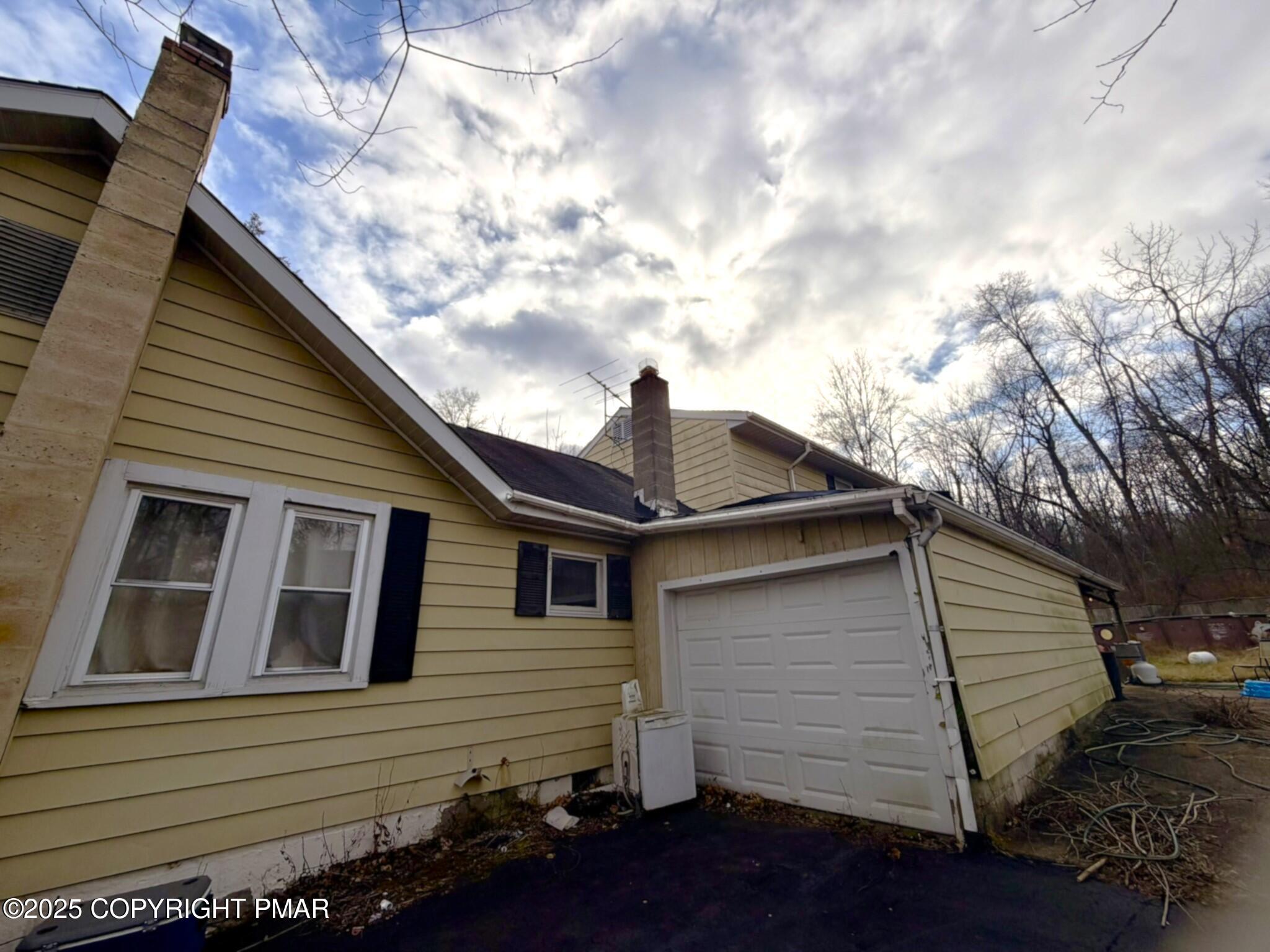 524 Independence Road East Stroudsburg, PA 18301 - Photo 4 of 17 a front view of a house with a balcony