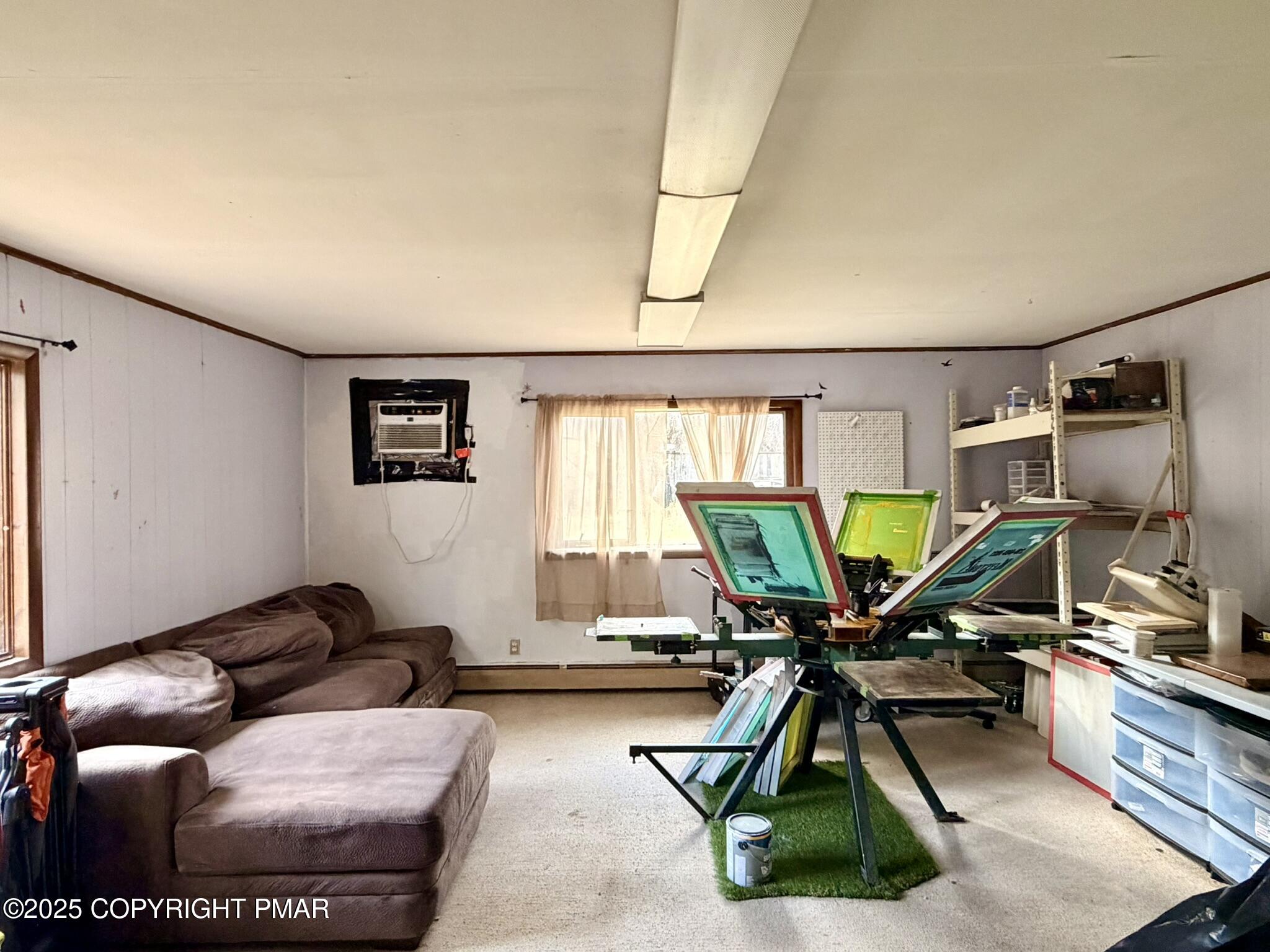 524 Independence Road East Stroudsburg, PA 18301 - Photo 10 of 17 a living room with furniture and a wooden floor