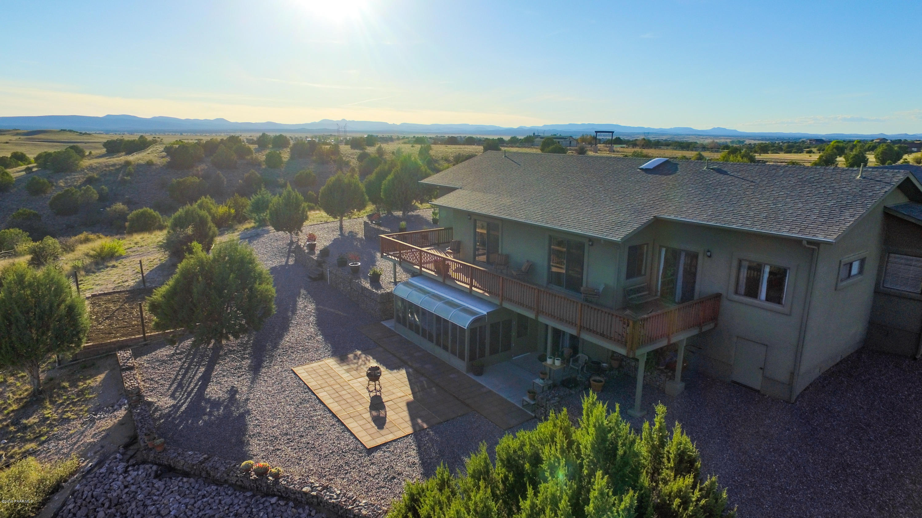 16901 Crossroads Ranch Road Prescott, AZ 86305 - Photo 20 of 22 an aerial view of a house with a garden and mountain view